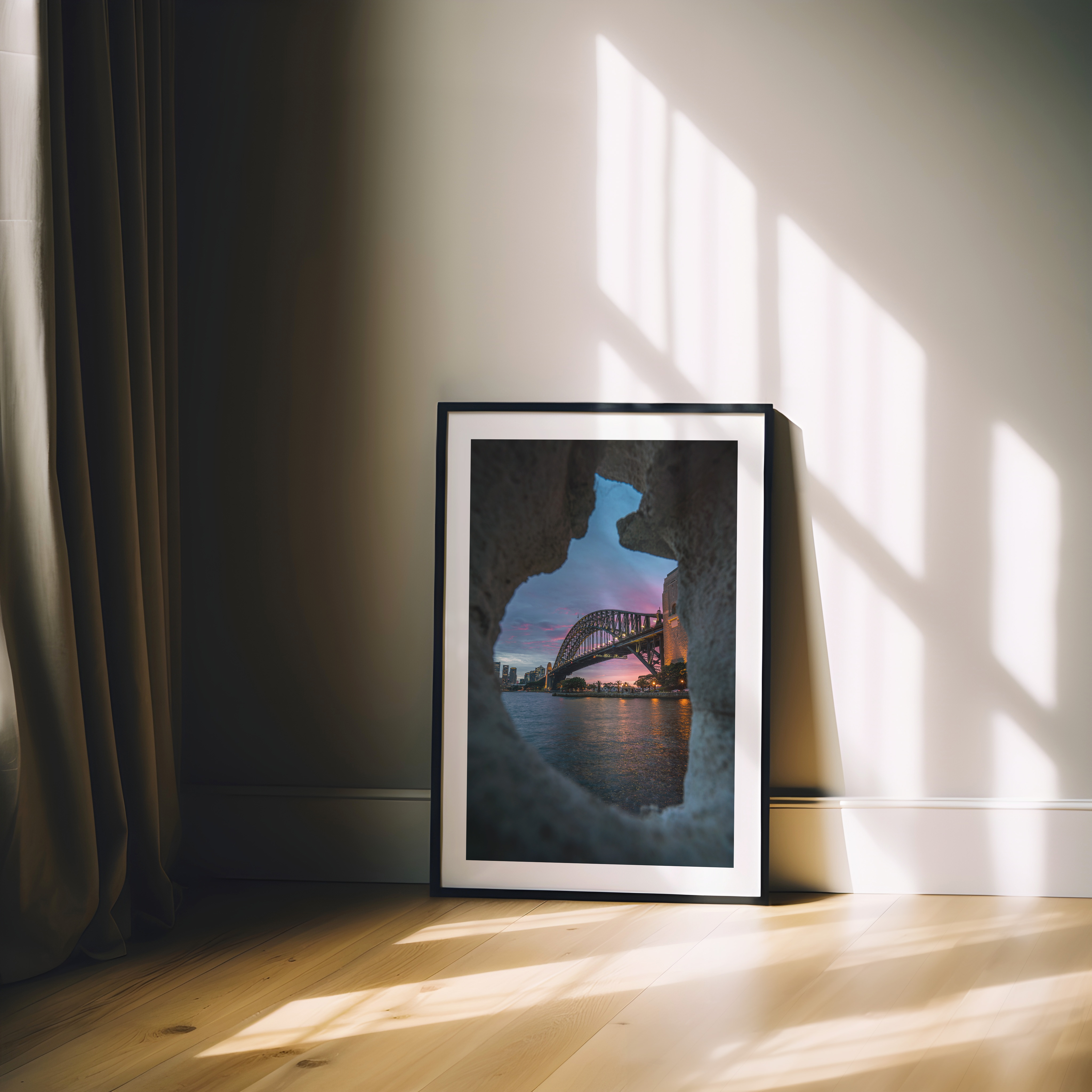 A framed James Cole print styled in a room